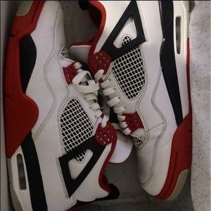 Authentic Jordan 4 “Fire Red”.